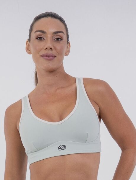 Top fitness verde Aloe com modelagem camiseta, busto alongado e decote V. Tecido com toque gelado, proteção UV 50+ e elástico embutido no cós.